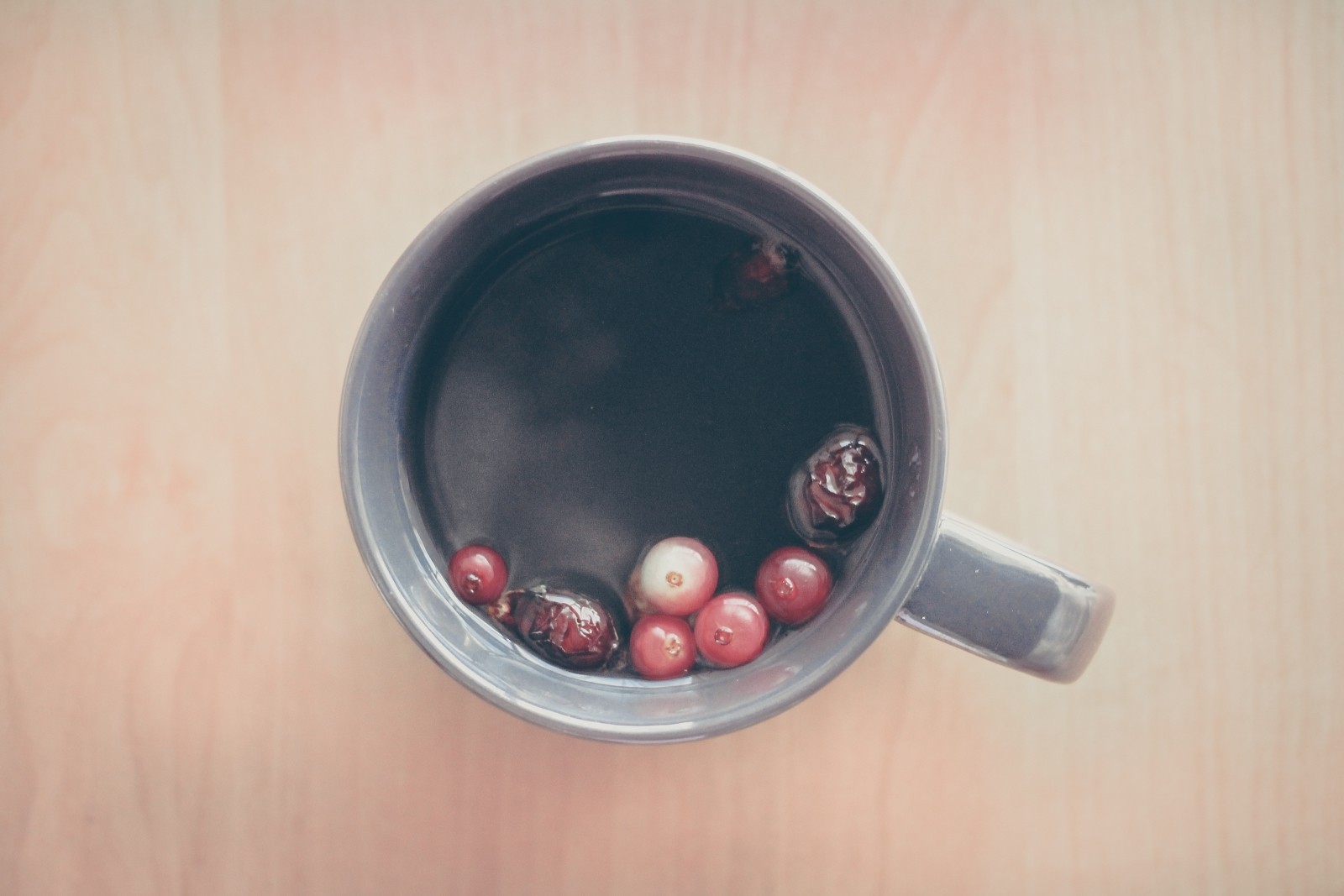 black tea with some berries inside